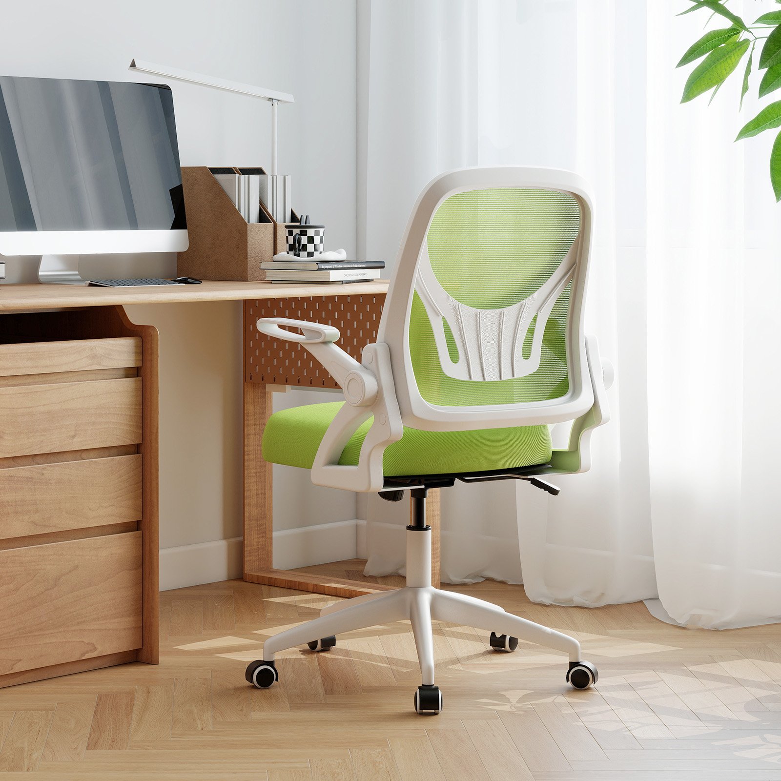 Cadeira de escritório ergonômica com apoios de braço dobráveis e função de balanço. Cor verde.
