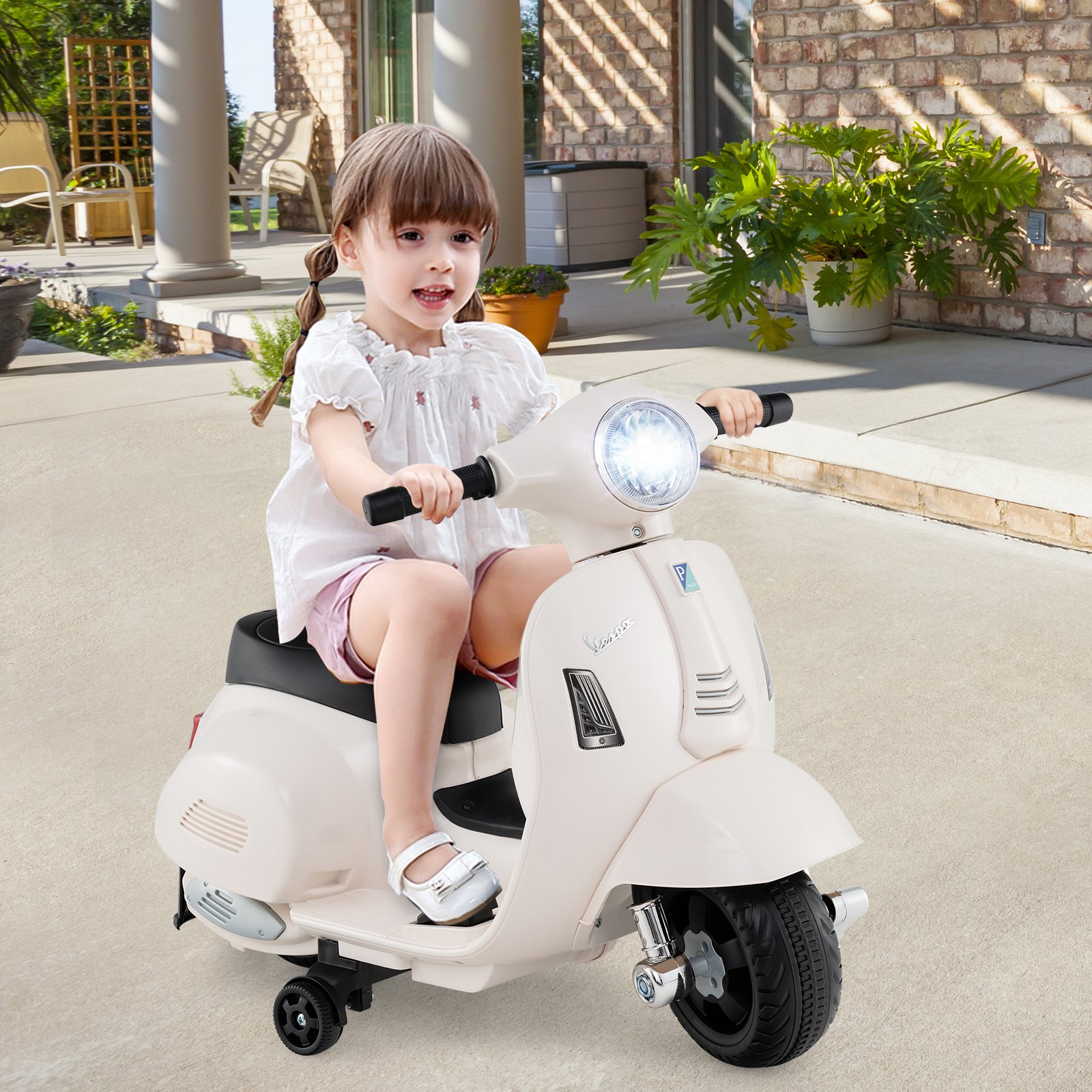 Motocicleta elétrica infantil Vespa licenciada, movida a bateria de 6V, com farol de LED branco.